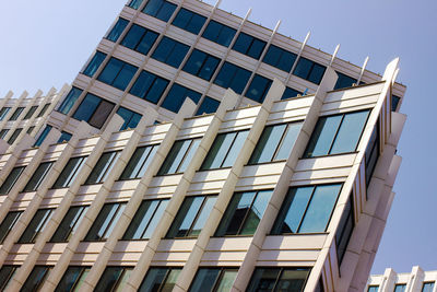 Low angle view of modern building against clear sky