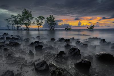 Scenic view of sea against sky during sunset