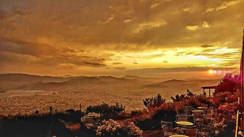 High angle view of city against sky during sunset