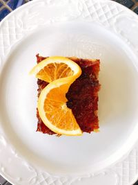 High angle view of fruit in plate on table