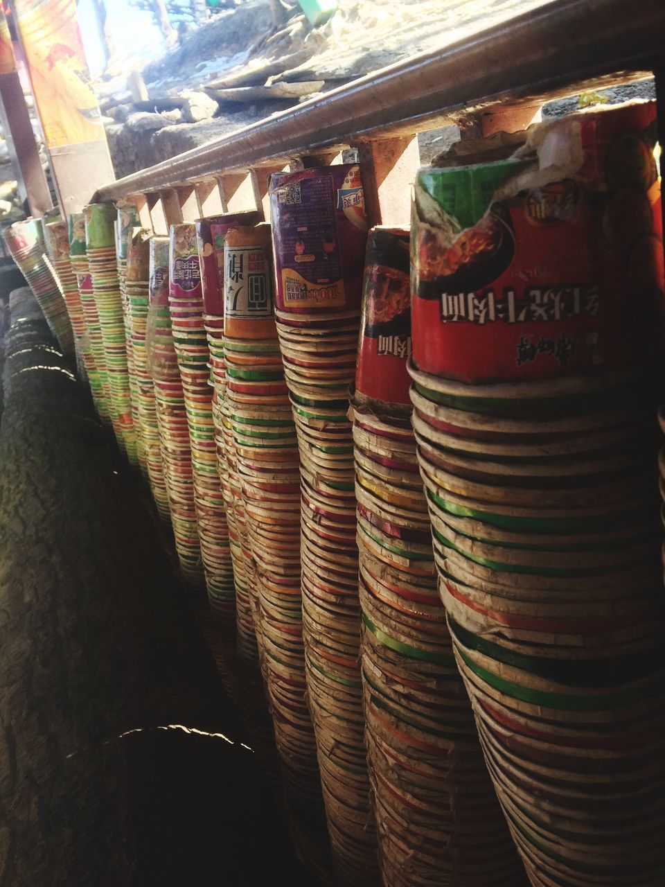 CLOSE-UP OF VARIOUS OBJECTS FOR SALE AT MARKET STALL