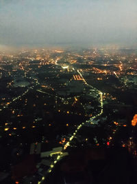 Aerial view of illuminated cityscape