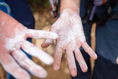 High angle view of man holding hands