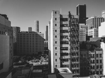 Modern buildings in city against sky