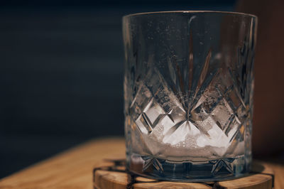 Close-up of beer glass on table