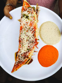 High angle view of food served in plate delicious indian cheese masala dosa in famous 56 food market