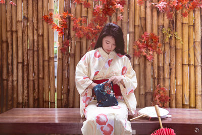 Portrait of young woman in traditional clothing