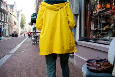 Rear view of man standing on street
