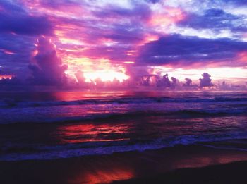 Scenic view of sea against cloudy sky