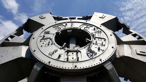 Low angle view of clock tower against sky