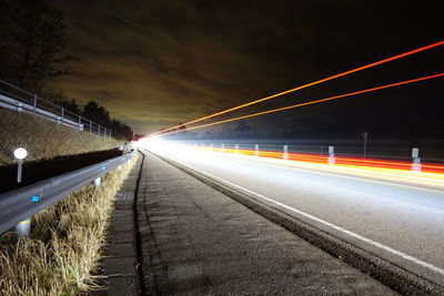 Light trails on road at night