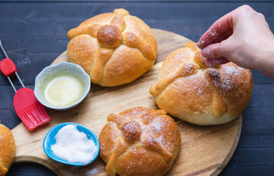 Close-up of hand holding breakfast