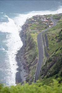 High angle view of road by sea