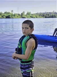 Portrait of boy in lake