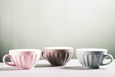 Close-up of coffee cup on table