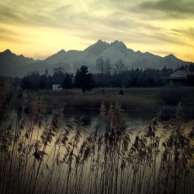 mountain, sunset, tranquil scene, scenics, mountain range, tranquility, sky, beauty in nature, water, lake, nature, idyllic, orange color, silhouette, cloud - sky, landscape, reflection, cloud, non-urban scene, outdoors