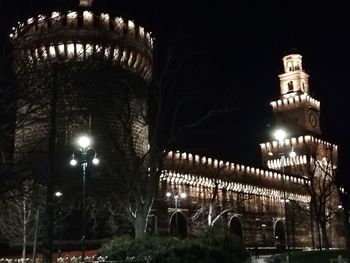 Low angle view of illuminated building at night