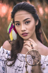 Close-up portrait of young woman