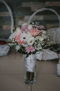 Close-up of flower vase on table