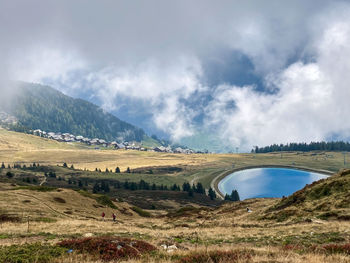 View in a cloudy atmosphere to a lake near bettmeralp, switzerland