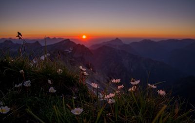 Scenic view of mountains against sky during sunset