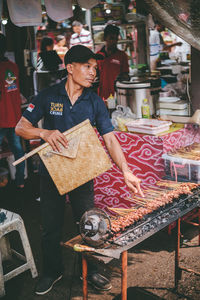 Woman working at market