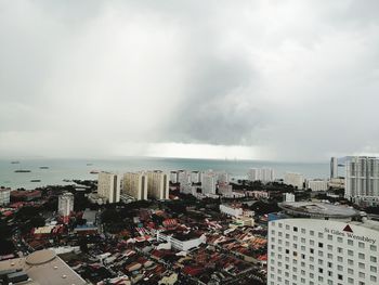 High angle view of buildings against sky