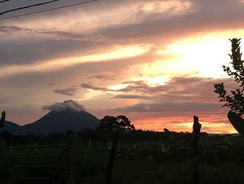 Scenic view of landscape against sky during sunset