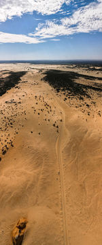 Scenic view of desert against sky