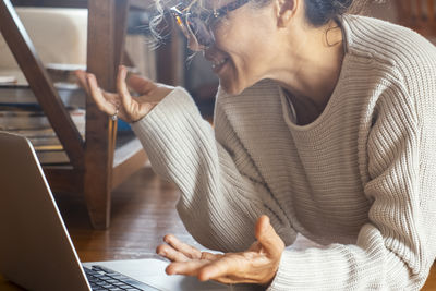 Young woman using laptop