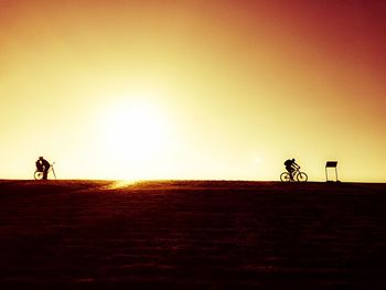 Scenic view of landscape at sunset