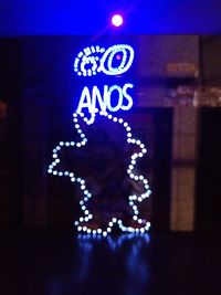 Close-up of illuminated christmas tree at night