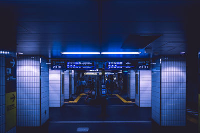 Interior of illuminated subway station