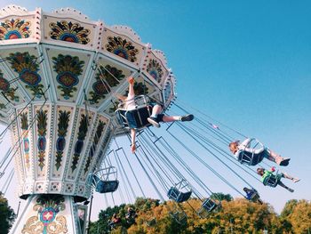 Low angle view of amusement park ride