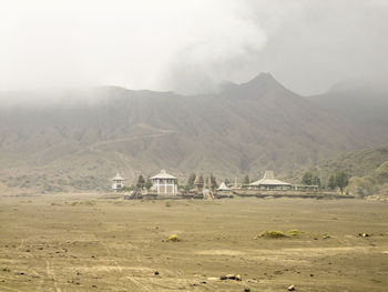 Scenic view of landscape and mountains against sky