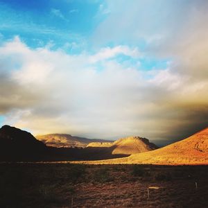 Scenic view of landscape against sky during sunset