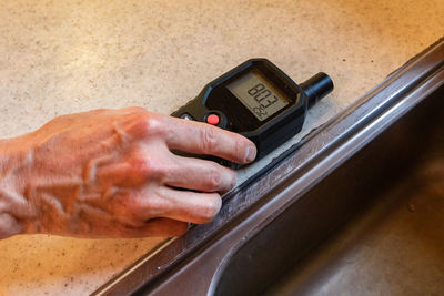 Close-up of man working on table