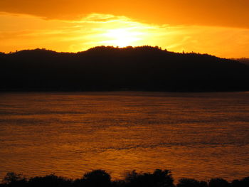 Scenic view of dramatic sky during sunset