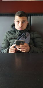 Young man using smart phone