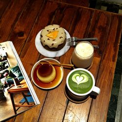 High angle view of coffee cups on table