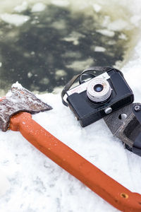 High angle view of chain on snow covered field