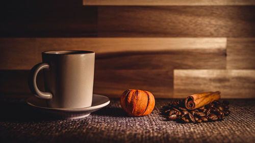 Close-up of coffee cup on table