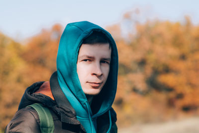 Portrait of a smiling adult man outdoors in casual clothes. travel, active lifestyle 