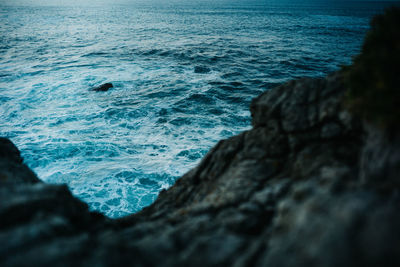 Scenic view of rocks on beach