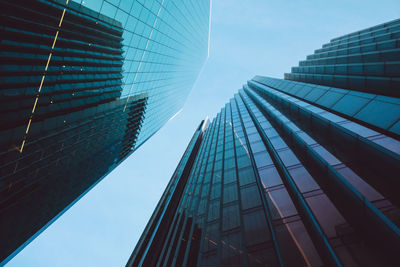 Low angle view of modern buildings against sky