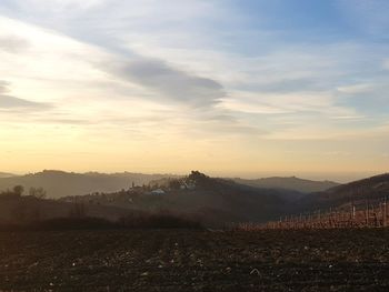 Scenic view of mountains against sky during sunset