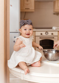 Cute baby boy at home