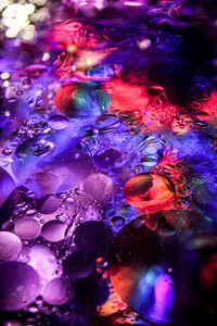 Close-up of illuminated lighting equipment in water