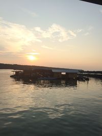 Scenic view of calm sea at sunset