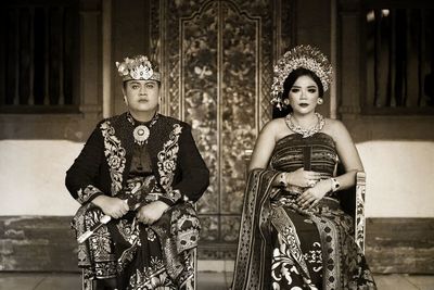 Portrait of the balinese bride sitting outdoors